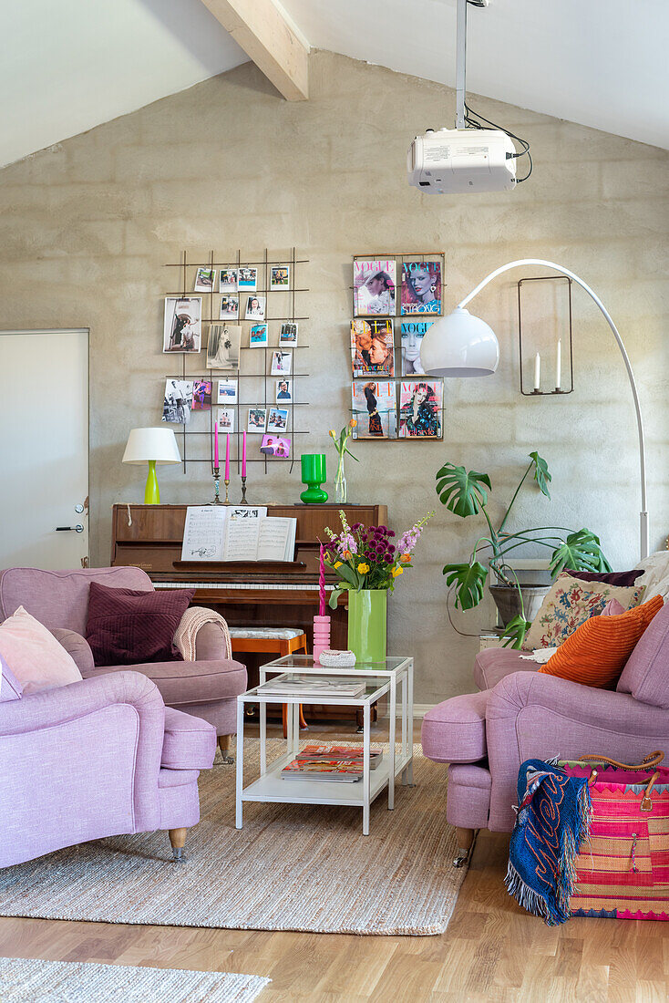 Living room with colourful accents, piano and arc lamp