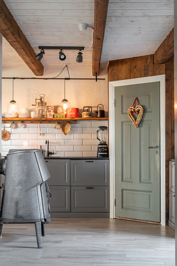 Country-style kitchen with exposed beams