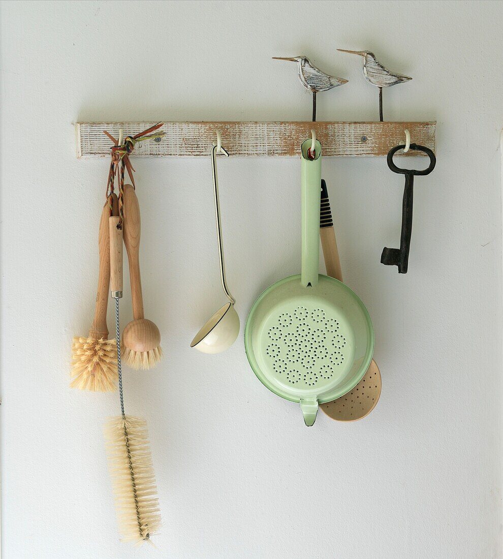 Rack of hanging kitchen utensils