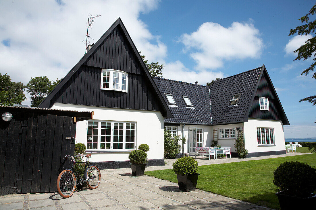 Exterior of house and a sunny garden