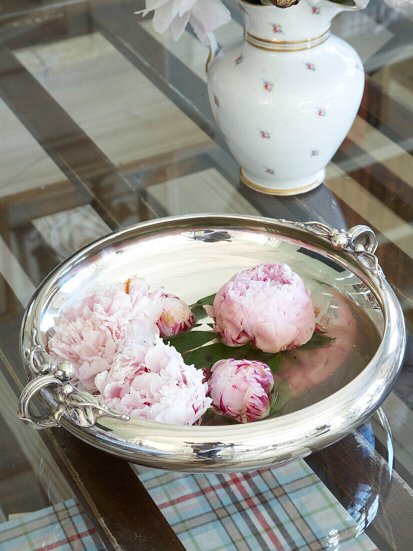 Flowers displayed in a silver bowl