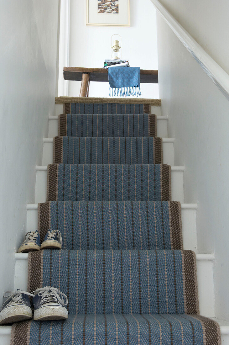 Treppe mit Teppichläufer