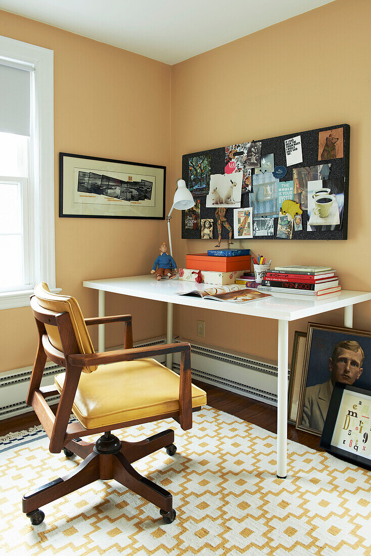 Pinboard above desk with wooden chair in Berkshires home, Massachusetts, Connecticut, USA
