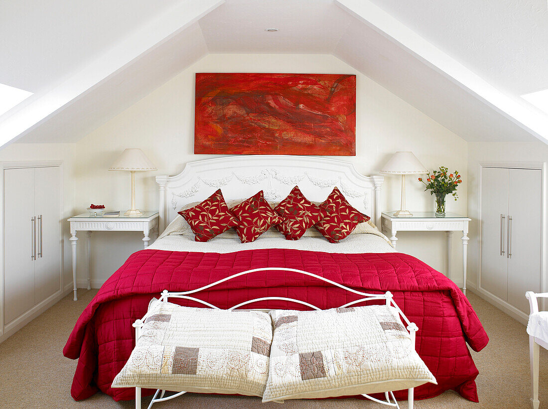 Cozy red and white bedroom