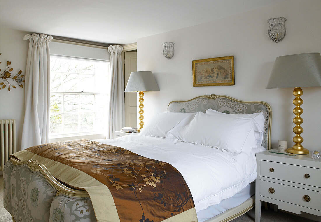 Light grey lamps in bedroom with gold finish city of Bath home Somerset, England, UK