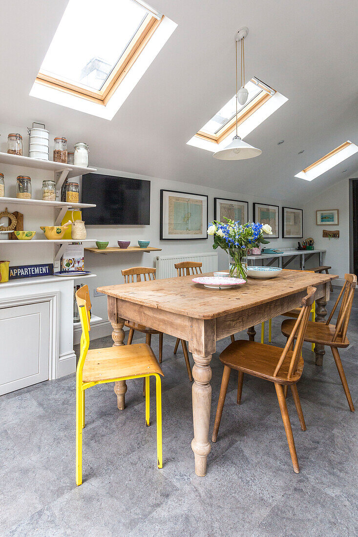 Skylight windows above wooden table in Reading kitchen Berkshire England UK