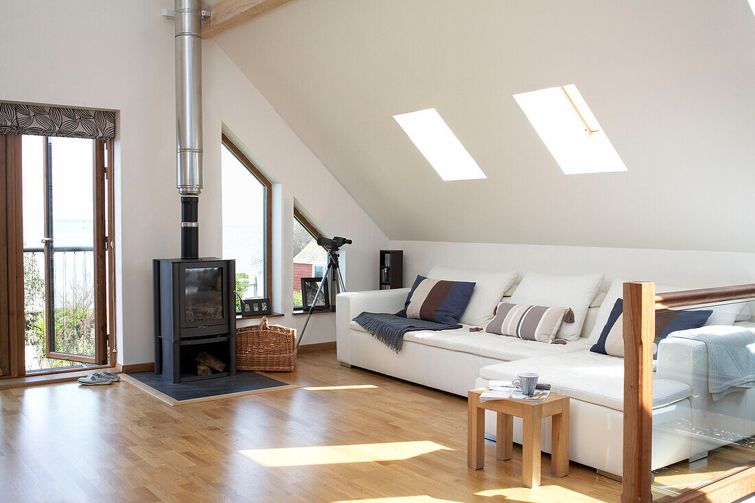 Wood burning stove in attic conversion of Isle of White home