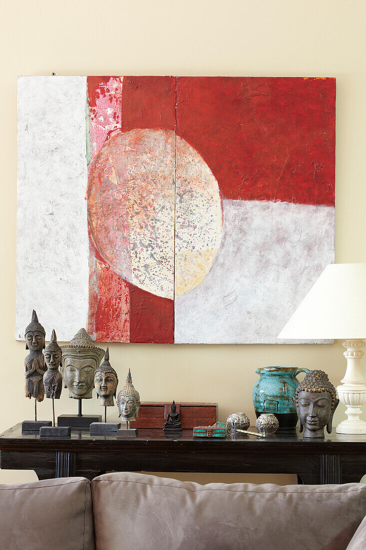 Buddhist statues and modern art canvas in Sydney home Australia