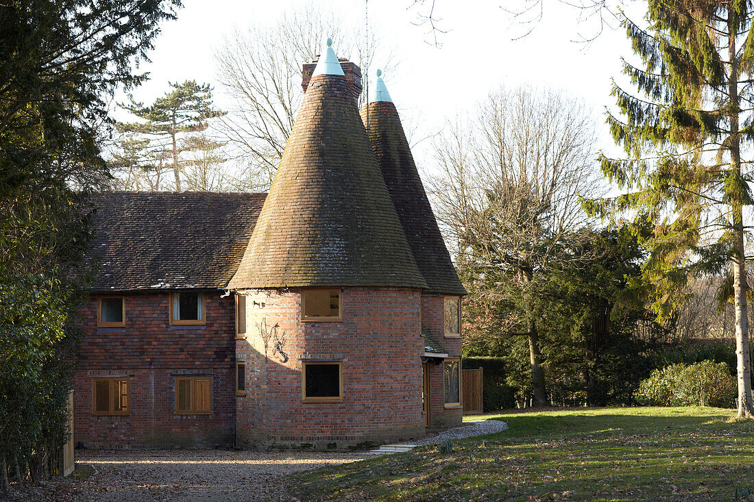 Modernised brick building set in own grounds, Kent, England, UK