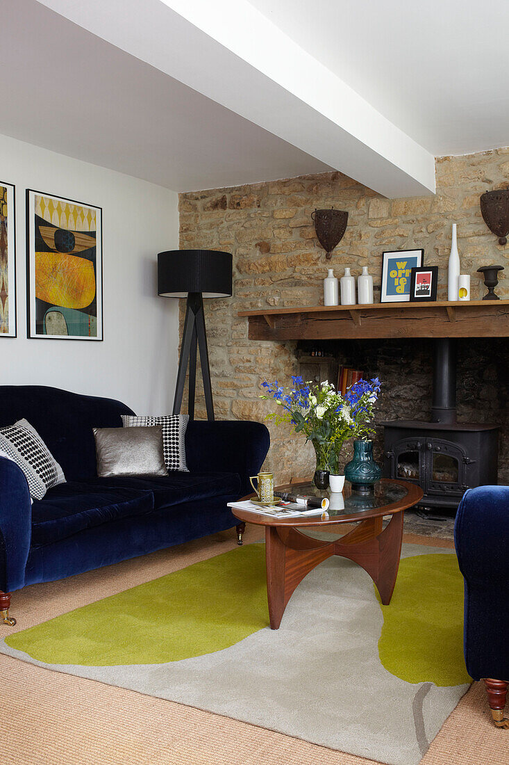 Blue velvet sofas in Coombe cottage, England, UK