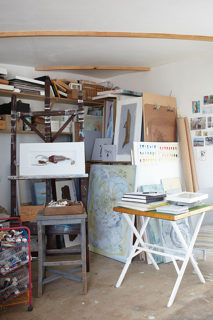 Easels and canvas in studio on Bembridge houseboat Isle of Wight, UK