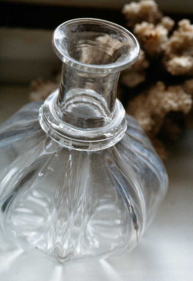 Detail of glass vase on window sill