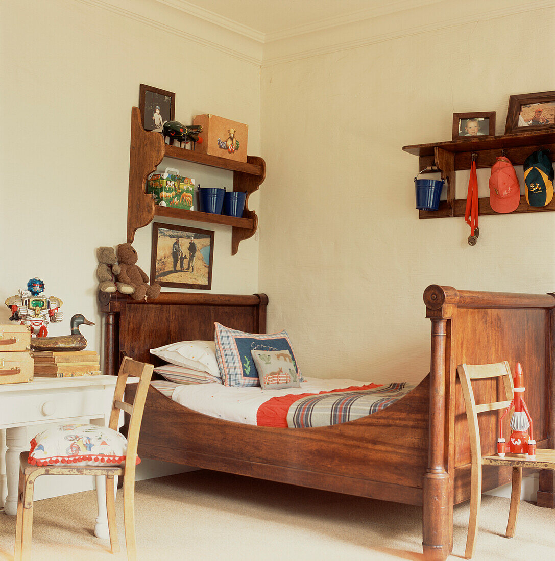 Child's bedroom with sleigh bed and toys