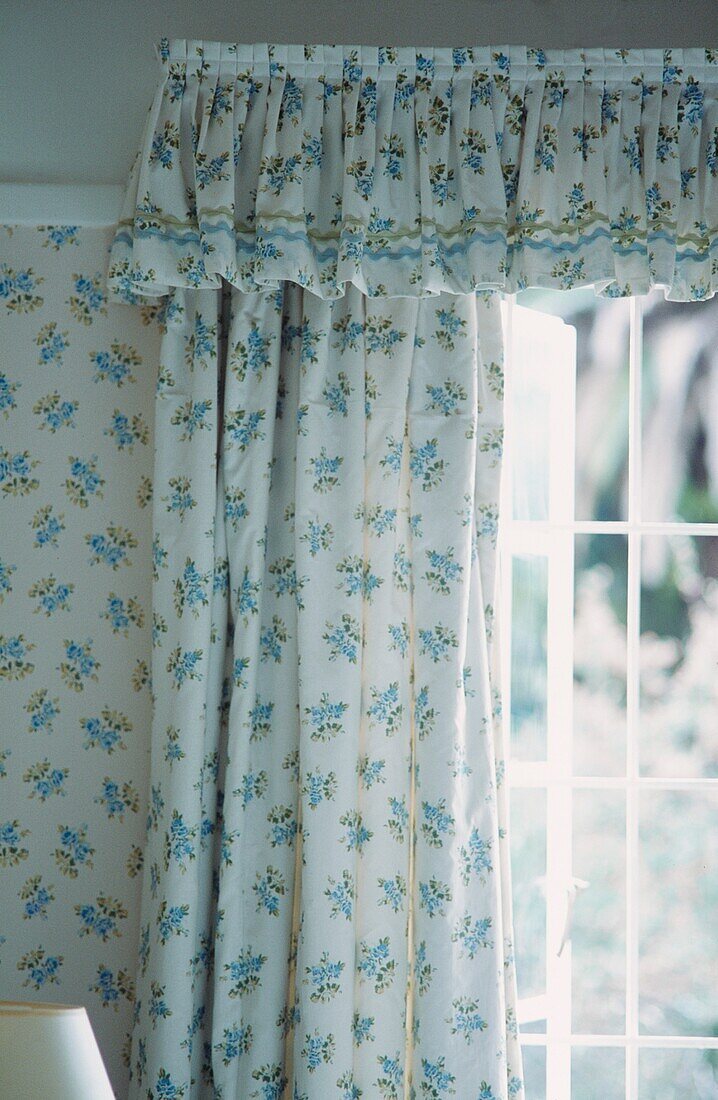 Matching wallpaper and curtains