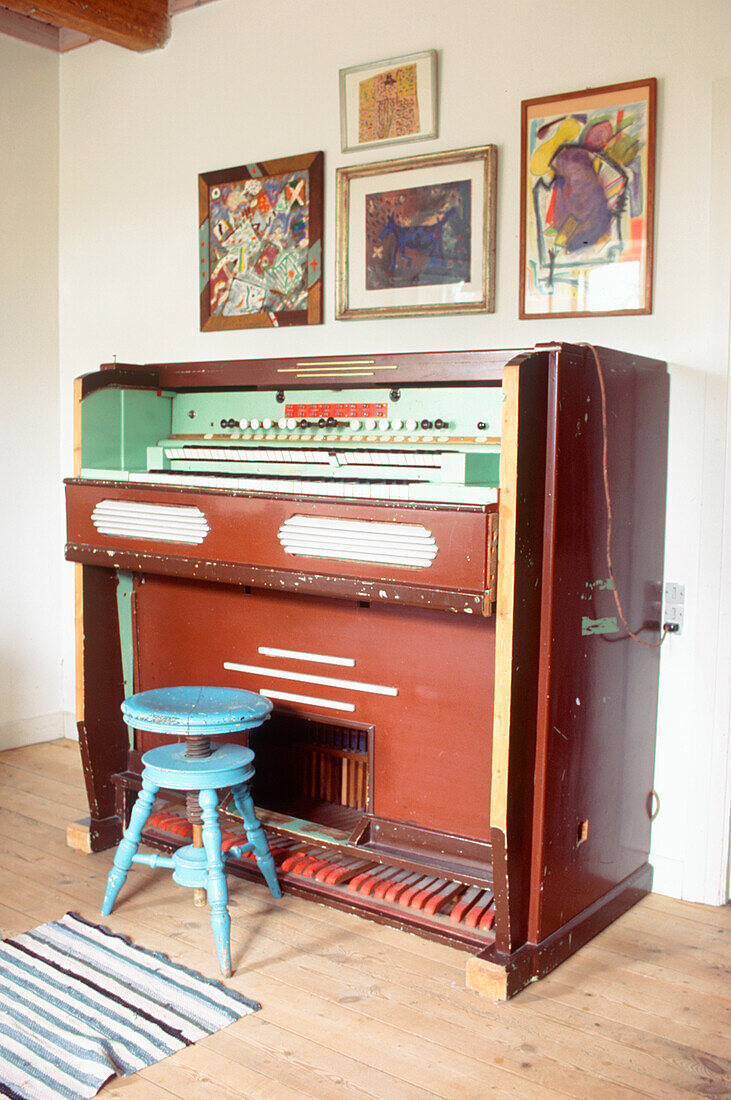Large vintage pipe organ in a music room