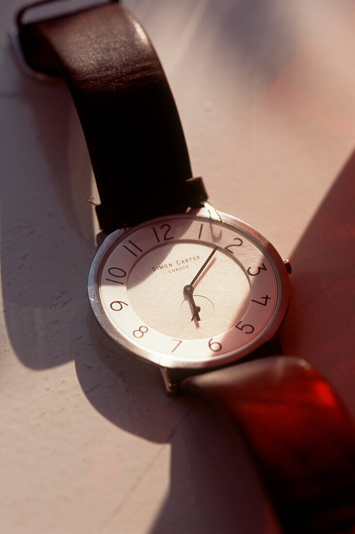 Detail of wrist watch telling the time