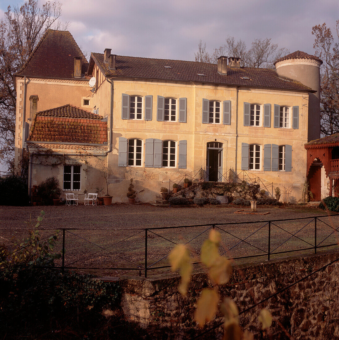 Large period French chateau with gravel driveway