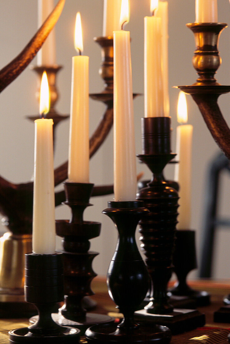 African turned wood candlesticks with stag horn candelabras