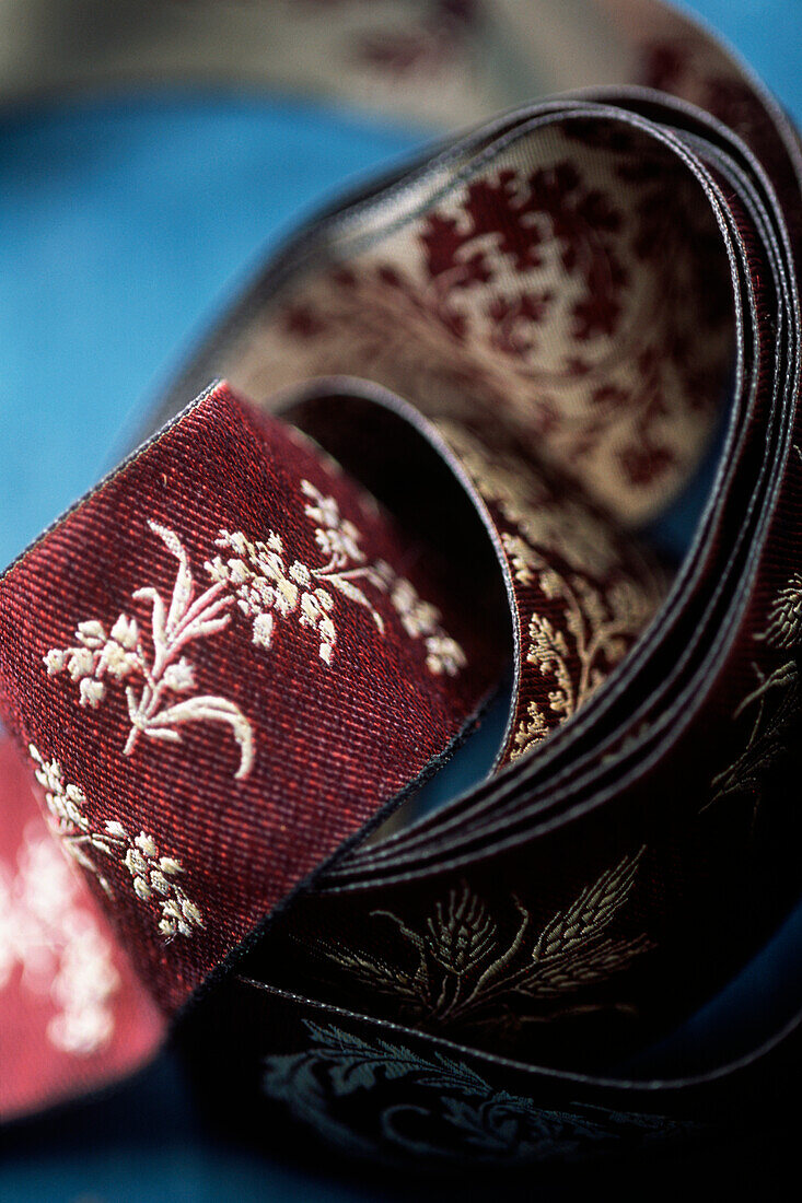 Detail of embroidered silk ribbons and trimmings