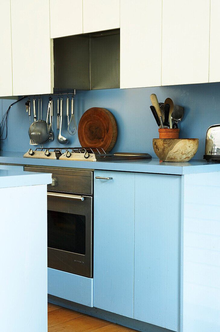Detail of open plan kitchen in blue and white