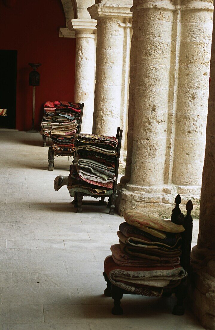 Stacks of clothes in colonnade