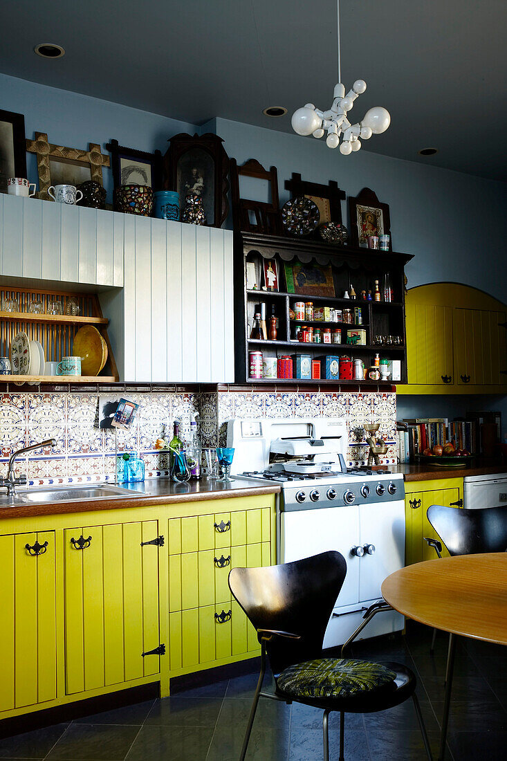 Yellow and Blue vintage styled kitchen with decorative wall tiles