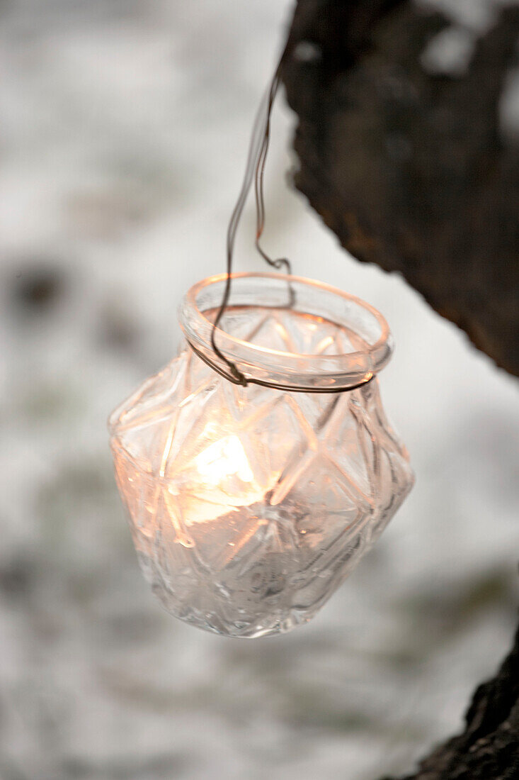 Glass tealight hanging outdoors