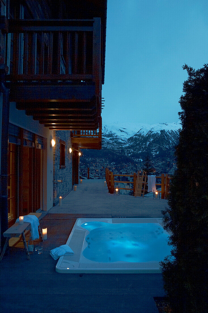Jacuzzi on balcony terrace of luxury Zermatt chalet, Switzerland