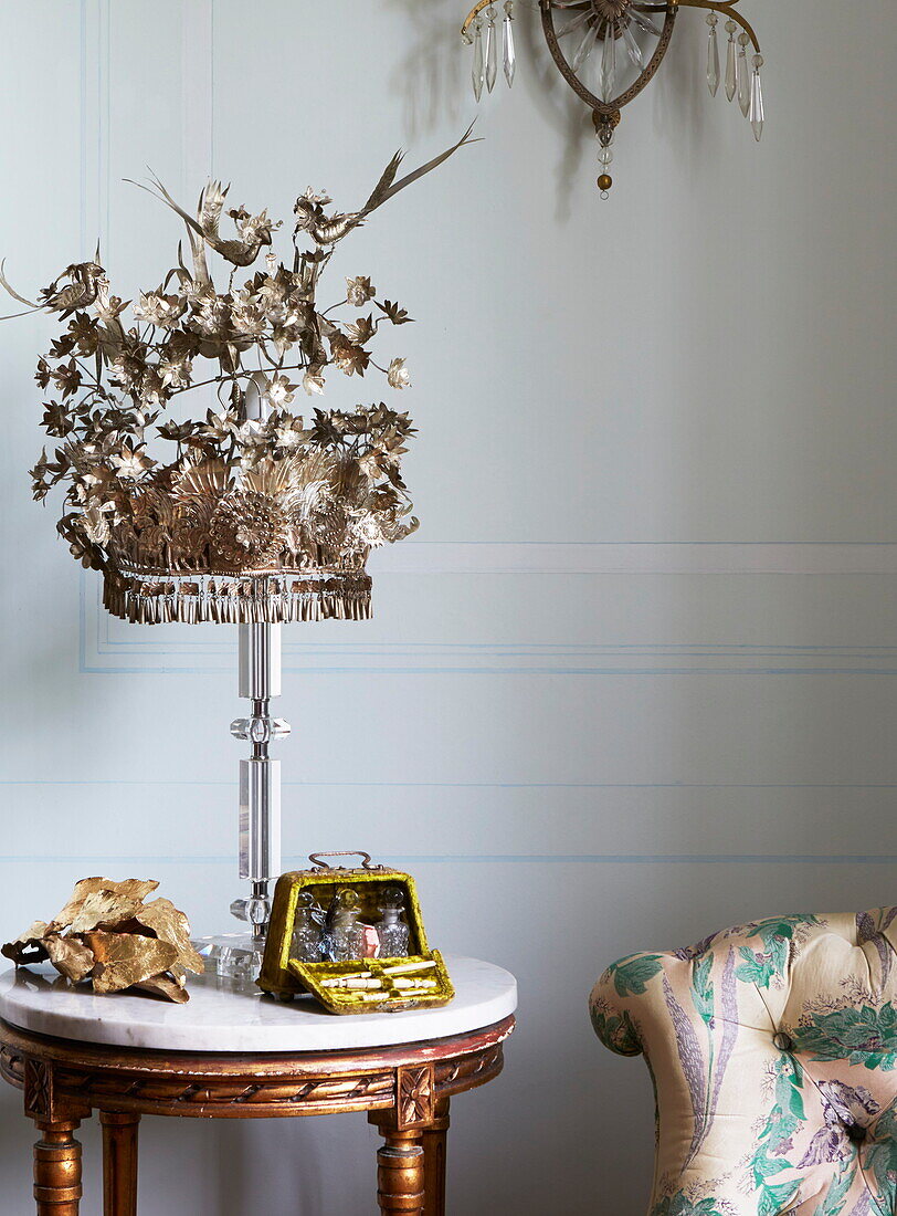 Decorative headdress on side table in Cumbria home, England, UK