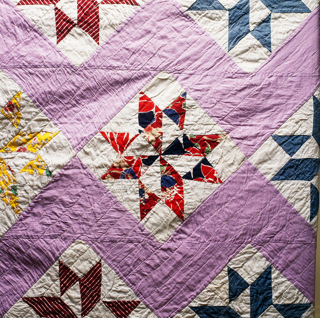 Multi-coloured patchwork quilt