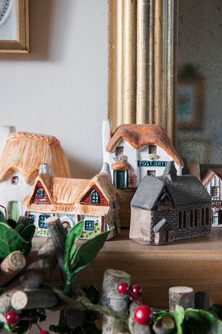 Painted model houses in Tiverton farmhouse  Devon  UK