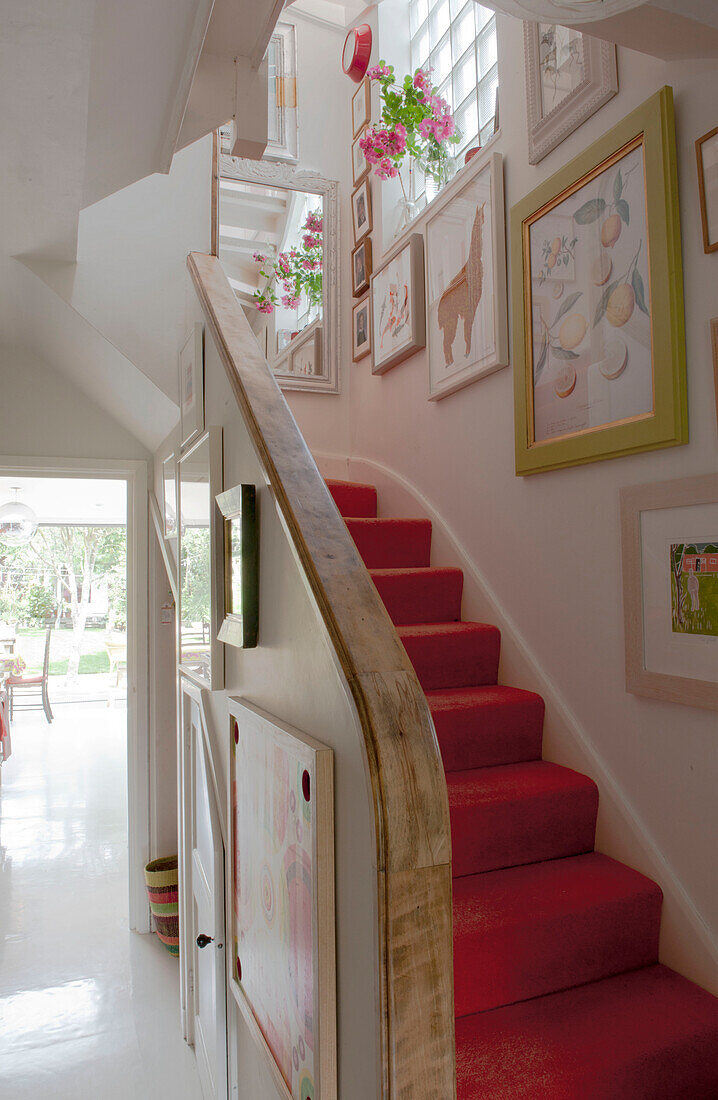 Red carpeted staircase in Lewes home,  East Sussex,  England,  UK