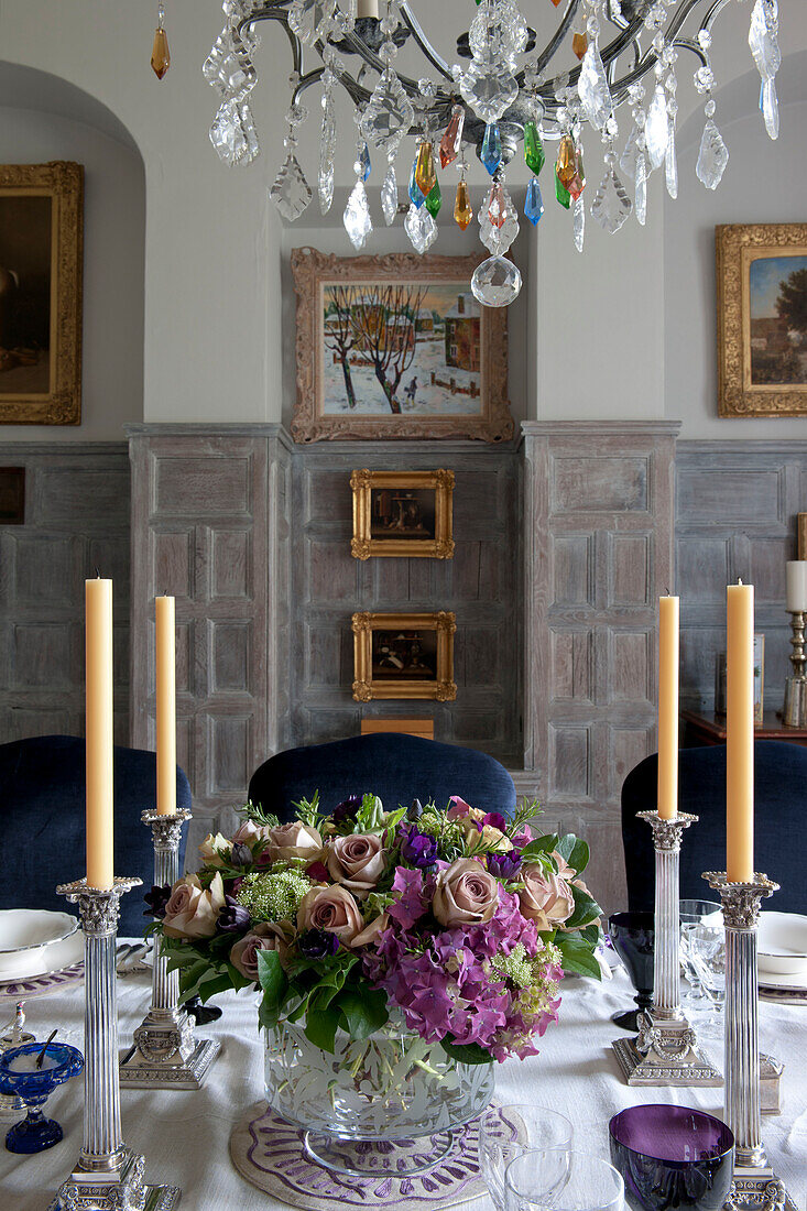 Cut rose centrepiece on dining table in Tiverton country home,  Devon,  England,  UK