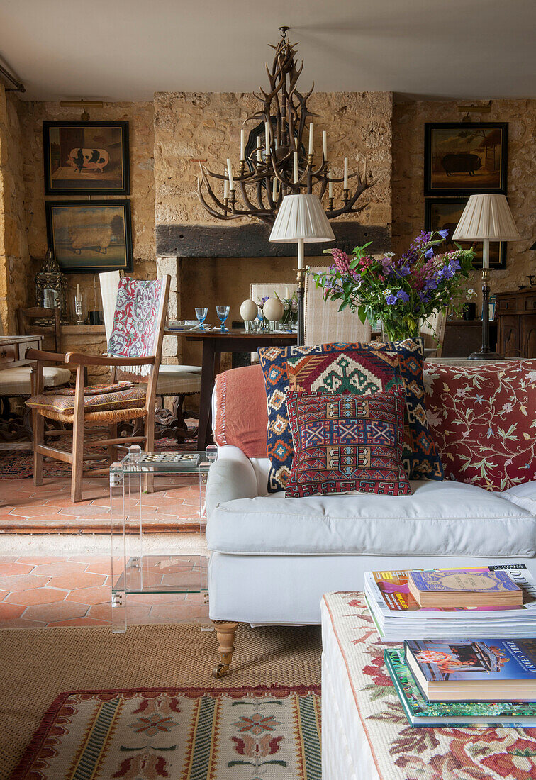 Patterned cushions on sofa in Dordogne country house  France