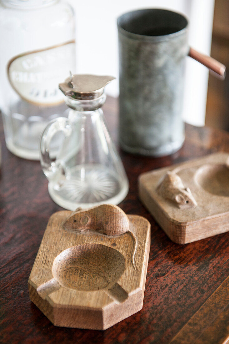 Carved wooden ashtrays with vintage homeware in Norfolk coastguards  cottage  England  UK