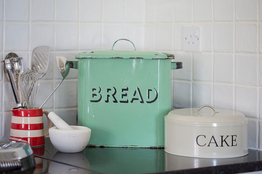 Bread bin and cake tin with utensils in Petworth farmhouse kitchen West Sussex Kent