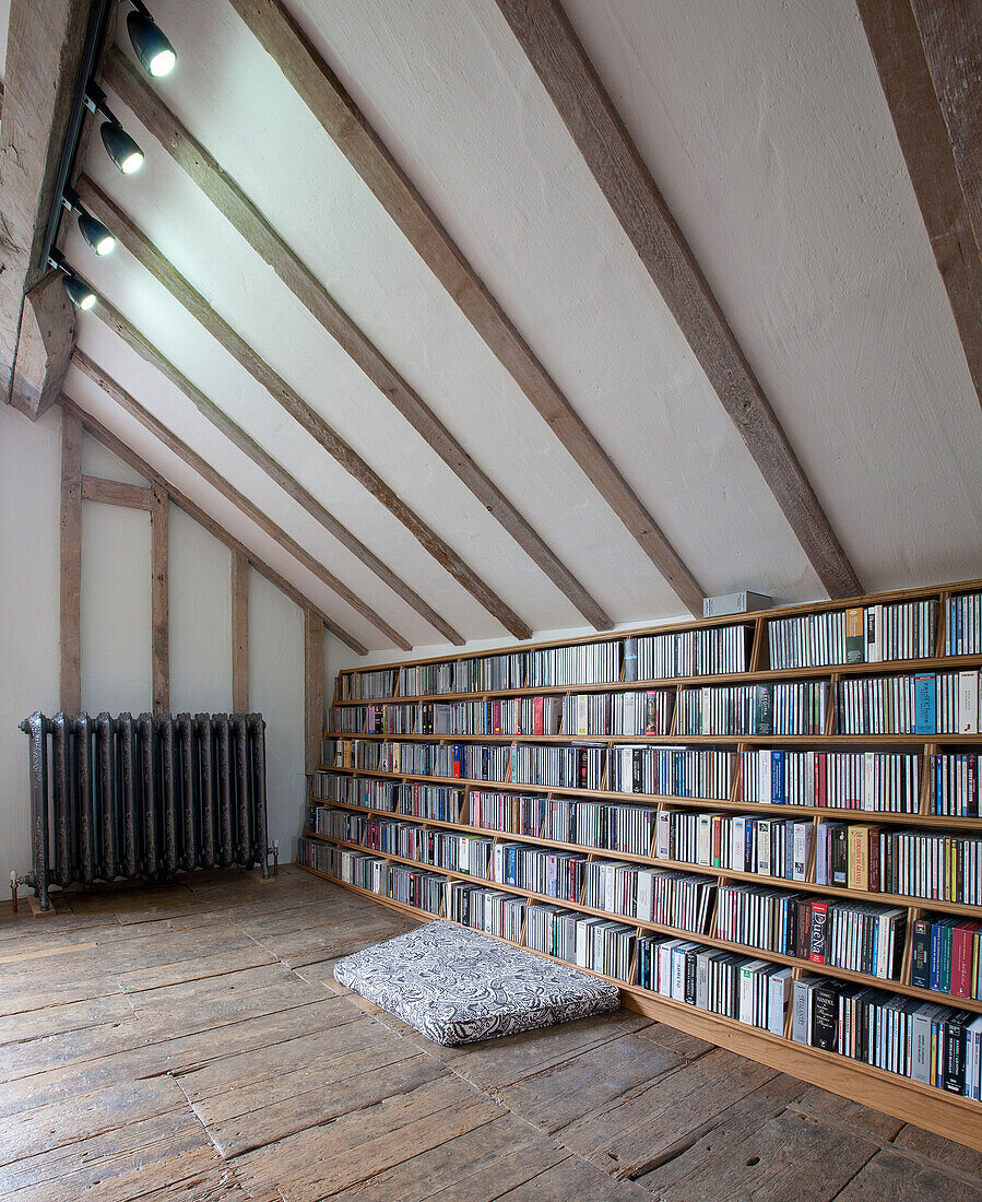 Reference library under beamed ceiling in watermill conversion