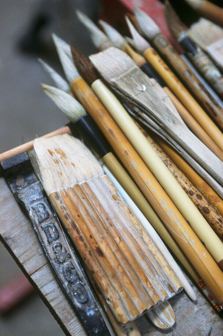 Close up of paint brushes and artists tools
