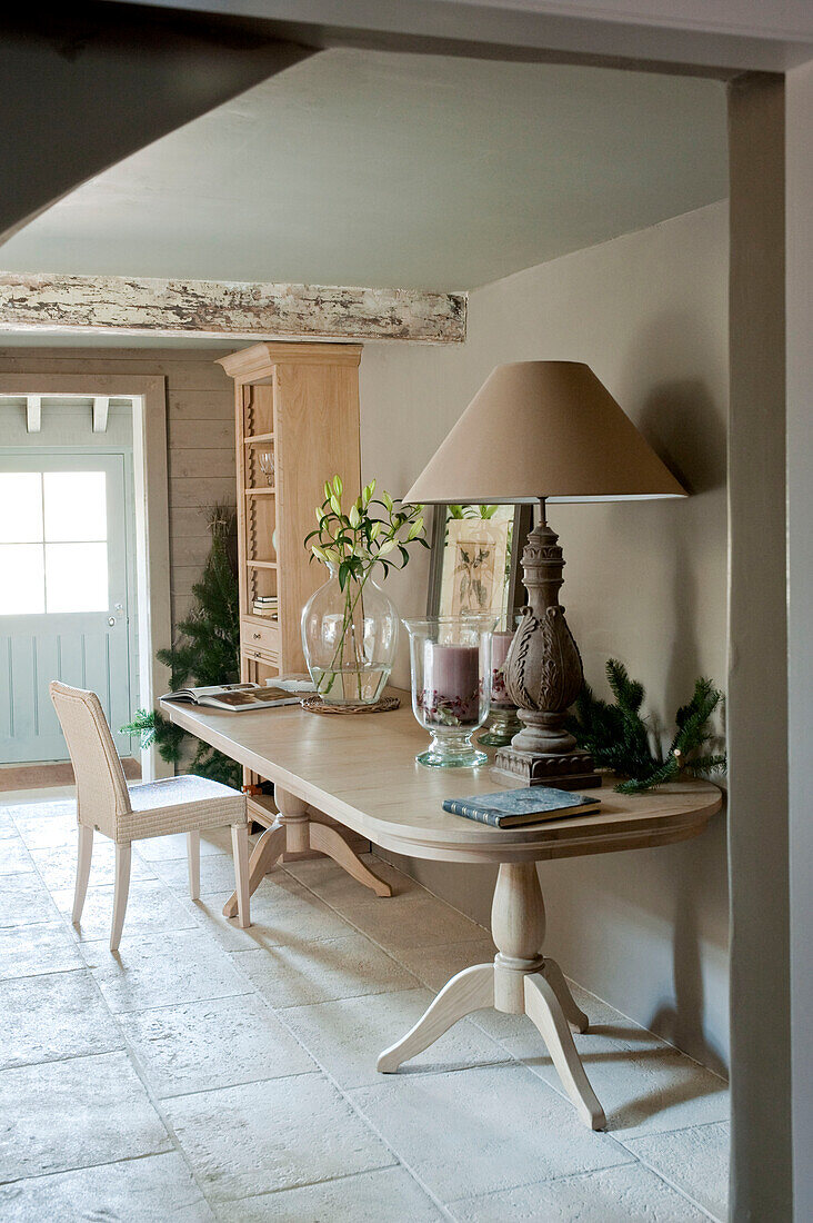 Light wood table and chair in beamed farmhouse Wiltshire