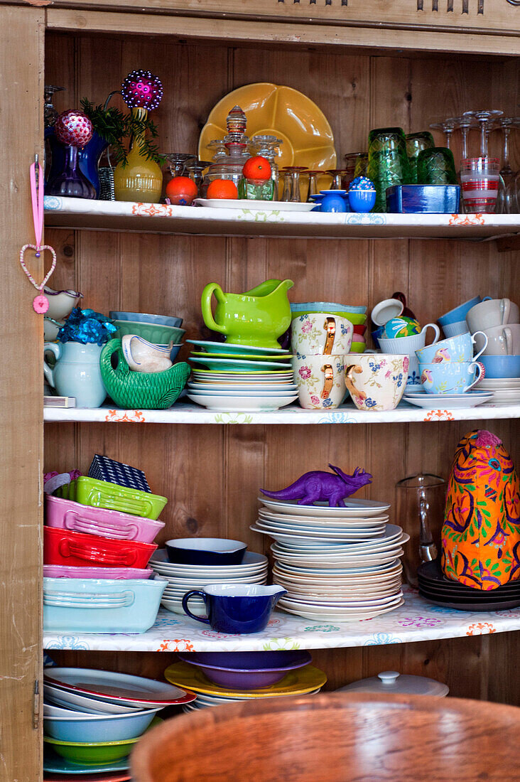 Kitchenware storage shelvesi n modern Odense family home Denmark