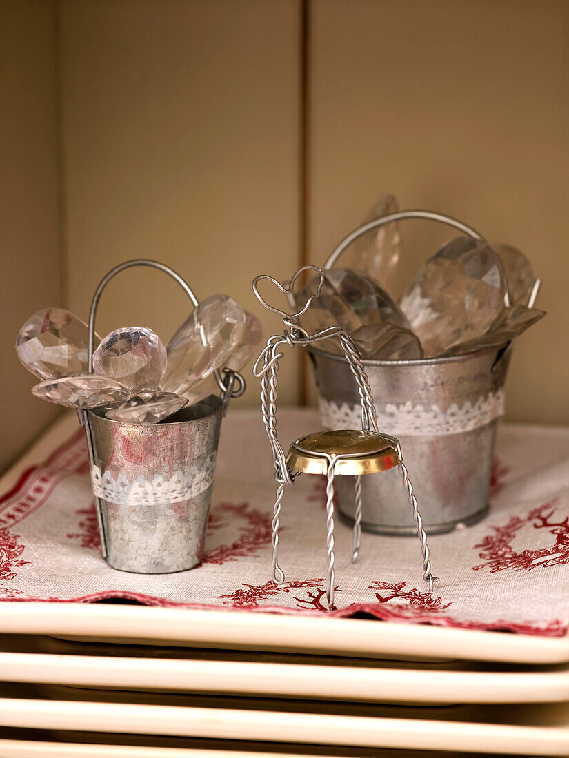 Dolls house furniture ice buckets and chair made from a champagne top