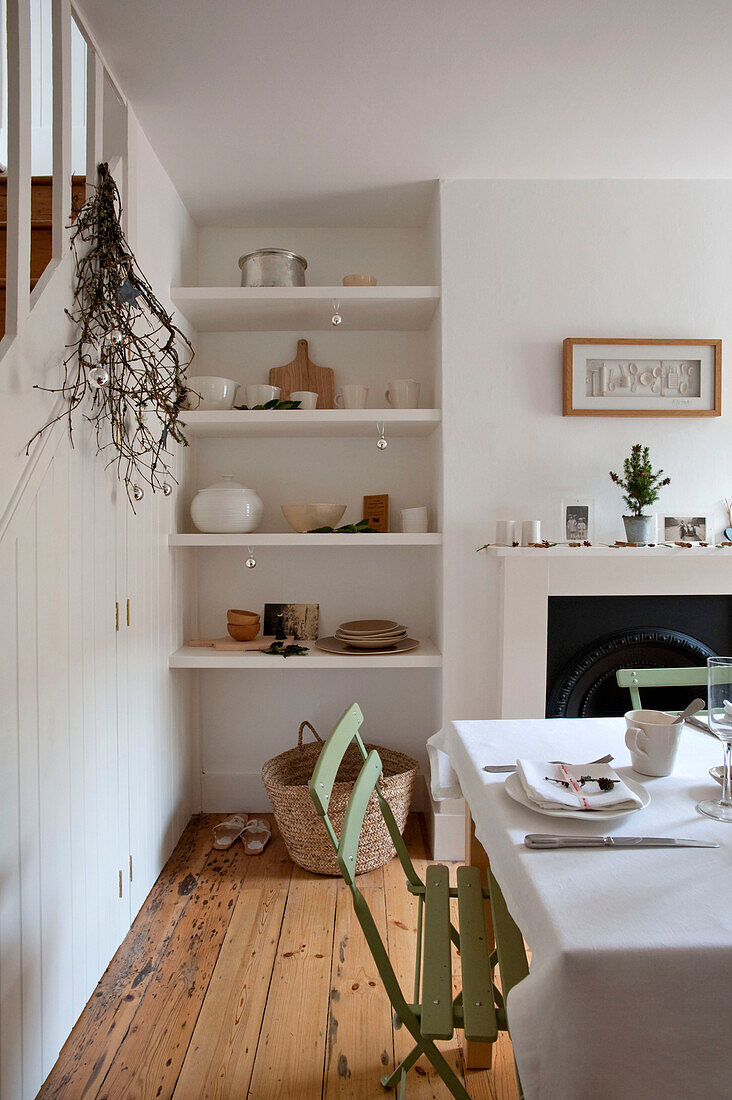 Recessed shelving in Richmond home with original fireplace