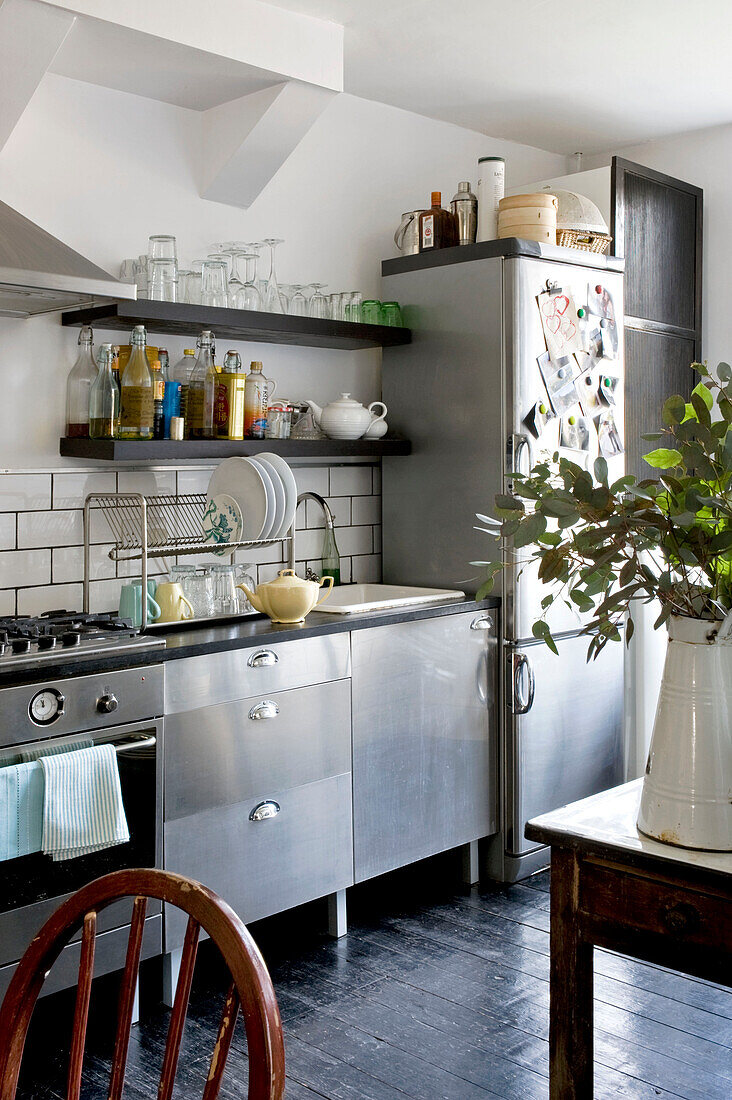Stainless steel modular kitchen in contemporary London home, UK