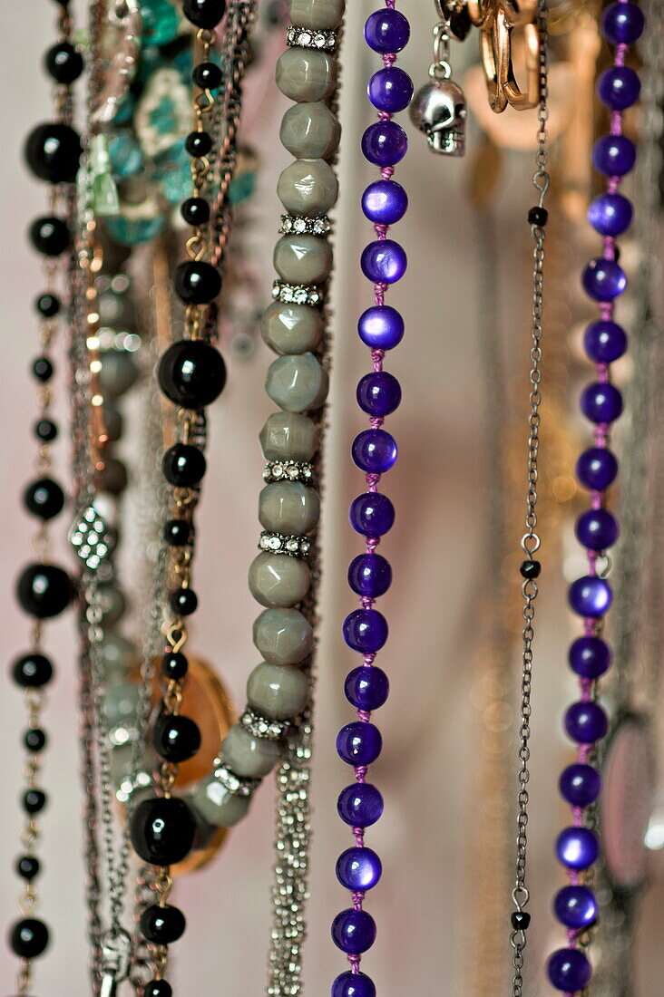 Beaded necklaces in London home, England, UK