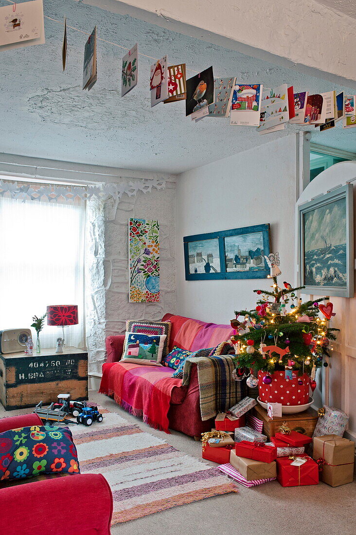 Greetings cards and Christmas tree in Penzance home Cornwall England UK