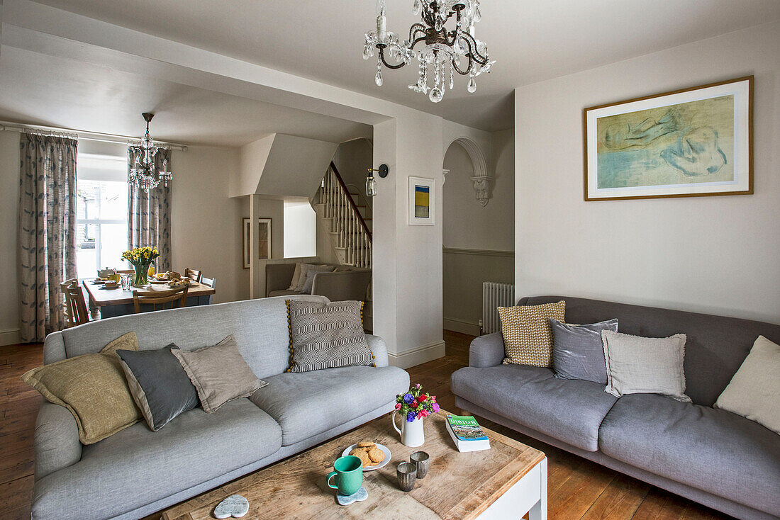 Grey sofa in living room of St Ives home Cornwall England UK