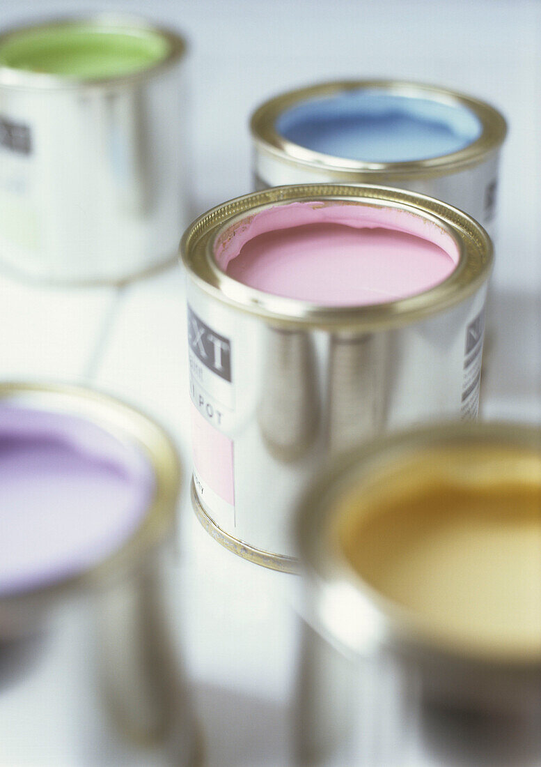 Different coloured paint pots