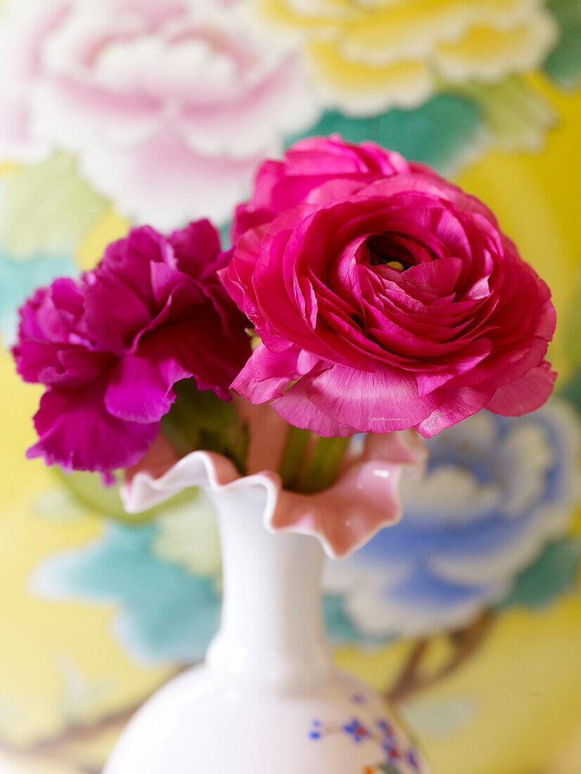 Bright pink flowers in vase