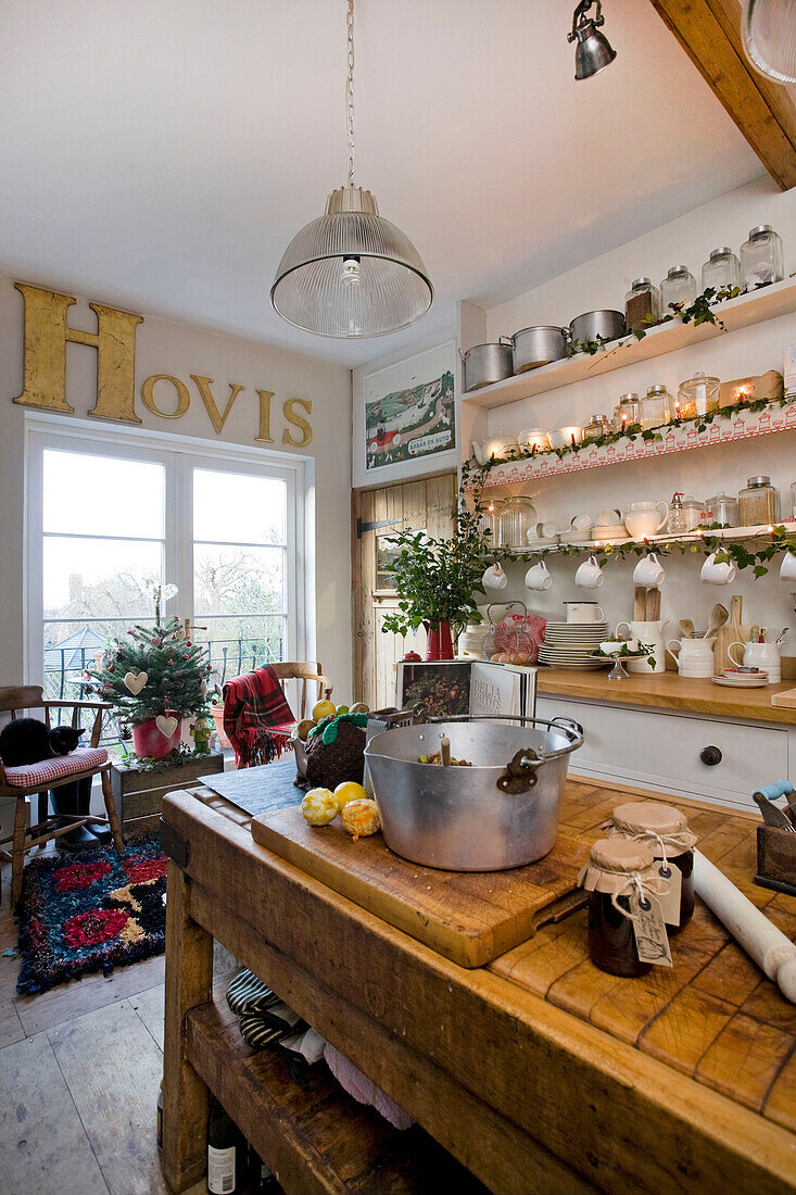 Kitchen at Christmas with Hovis sign and small tree, Tenterden, Kent