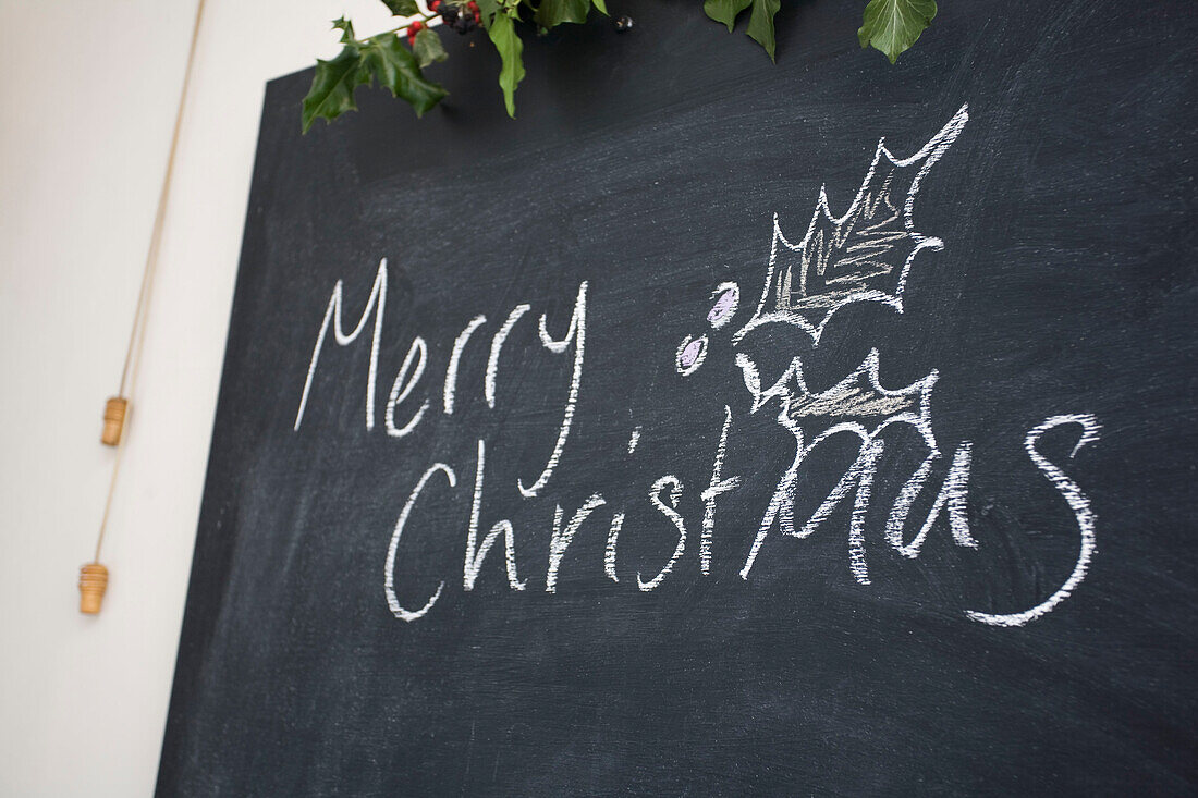 Christmas greeting on blackboard in Tenterden home, Kent, England, UK